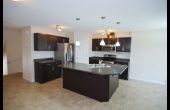Gourmet kitchen with huge island and upgraded appliances